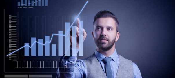 A screen with a graph with increasing bar columns rising.
